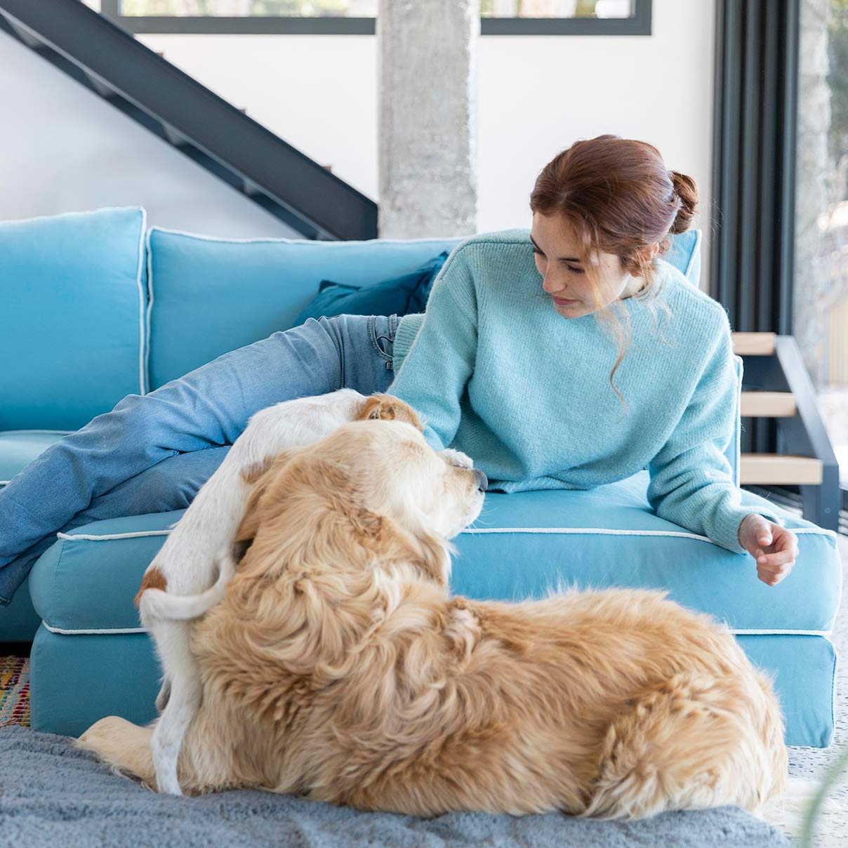 woman-with-cute-dog-indoors-1208×1208